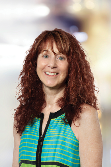 Portrait of Karen Kneib, Home Marketing Consultant.